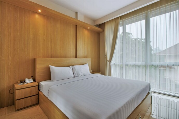 Imagen de la habitación del Hotel D'Padmaya Residence. Foto 4