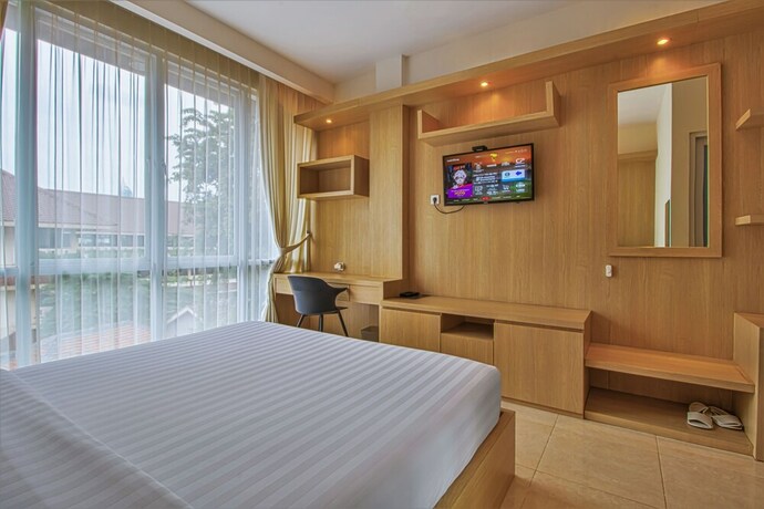 Imagen de la habitación del Hotel D'Padmaya Residence. Foto 6