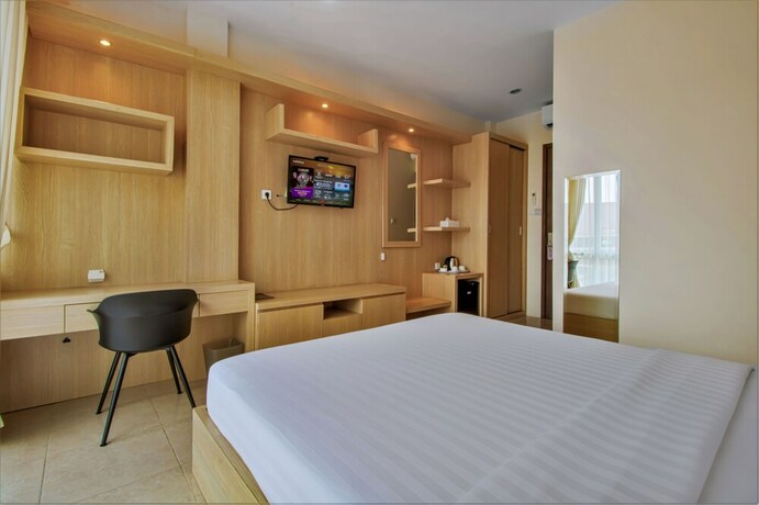 Imagen de la habitación del Hotel D'Padmaya Residence. Foto 8