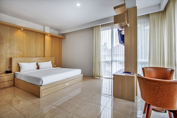 Imagen de la habitación del Hotel D'Padmaya Residence. Foto 9