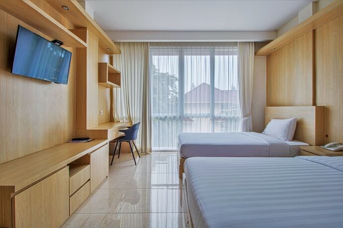 Imagen de la habitación del Hotel D'Padmaya Residence. Foto 12