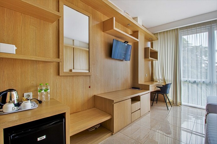 Imagen de la habitación del Hotel D'Padmaya Residence. Foto 13