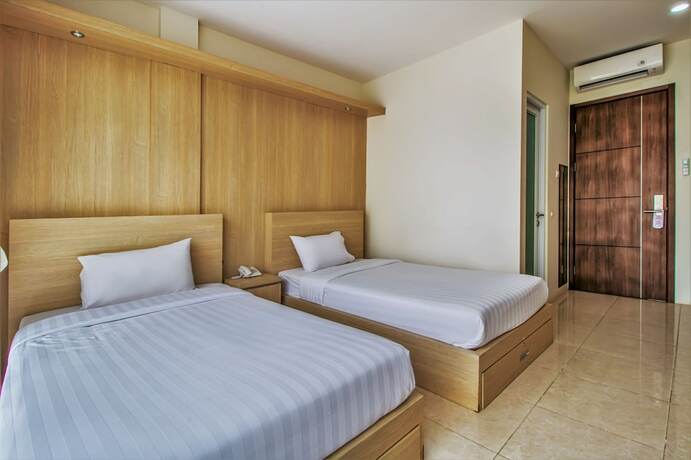Imagen de la habitación del Hotel D'Padmaya Residence. Foto 14