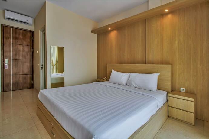 Imagen de la habitación del Hotel D'Padmaya Residence. Foto 15