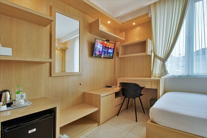 Imagen de la habitación del Hotel D'Padmaya Residence. Foto 16