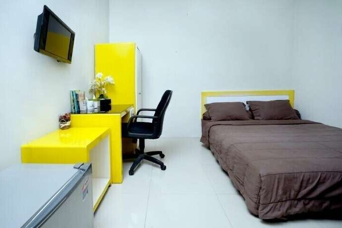 Imagen de la habitación del Hotel D'Paragon Tambakboyo. Foto 9