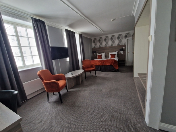 Imagen de la habitación del Hotel DR HOLMS. Foto 6