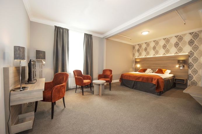 Imagen de la habitación del Hotel DR HOLMS. Foto 7
