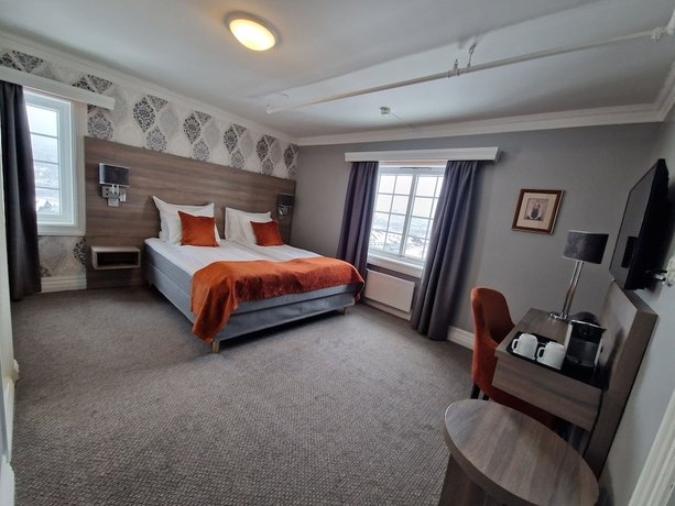 Imagen de la habitación del Hotel DR HOLMS. Foto 13