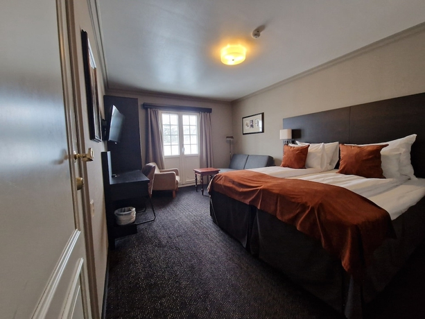 Imagen de la habitación del Hotel DR HOLMS. Foto 15