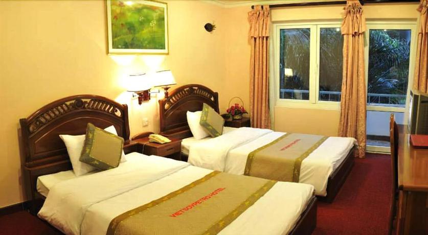 Imagen de la habitación del Hotel DRAGON KING HOTEL. Foto 10