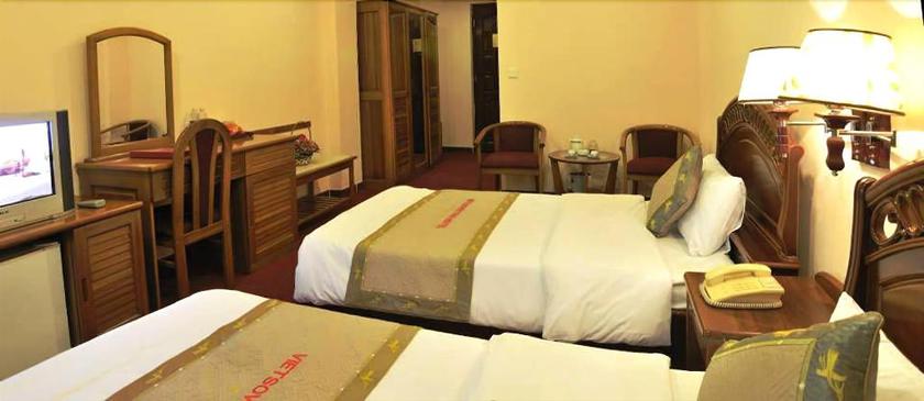 Imagen de la habitación del Hotel DRAGON KING HOTEL. Foto 11