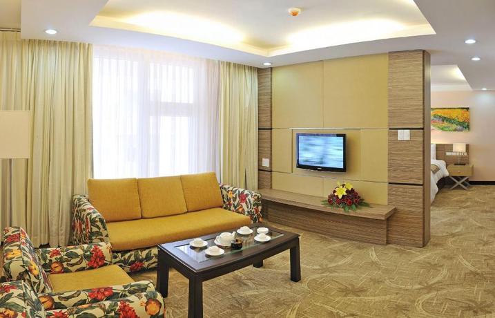 Imagen de la habitación del Hotel DRAGON KING HOTEL. Foto 14