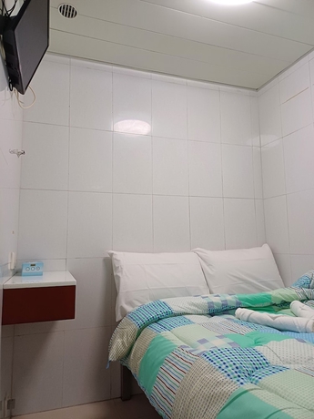 Imagen de la habitación del Hotel DREAMNEST GUESTHOUSE. Foto 10