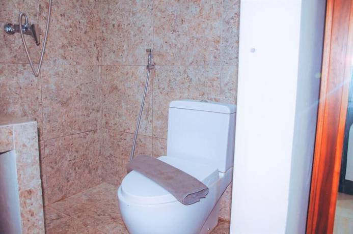 Imagen de la habitación del Hotel DS Residences Peterongan. Foto 7