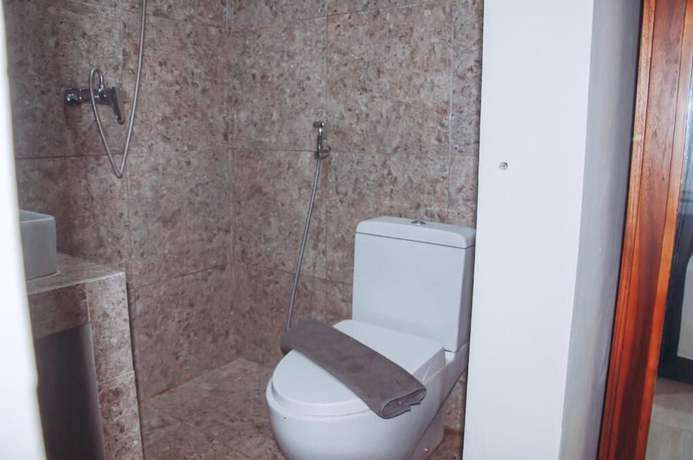 Imagen de la habitación del Hotel DS Residences Peterongan. Foto 10