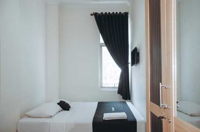 Imagen de la habitación del Hotel DS Residences Peterongan. Foto 15