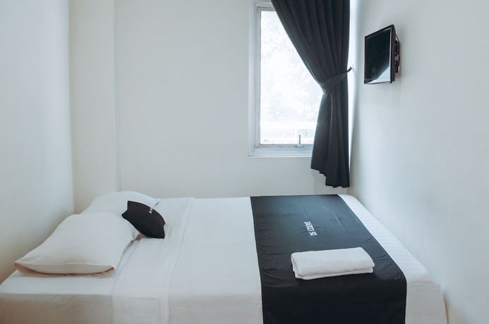Imagen de la habitación del Hotel DS Residences Peterongan. Foto 18