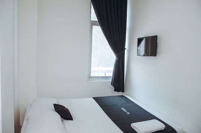 Imagen de la habitación del Hotel DS Residences Peterongan. Foto 19