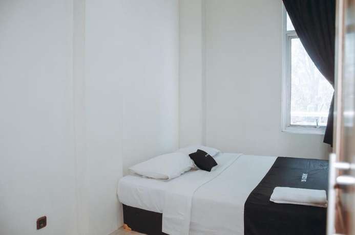 Imagen de la habitación del Hotel DS Residences Peterongan. Foto 20
