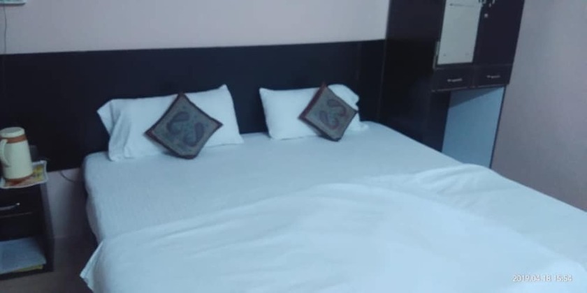 Imagen de la habitación del Hotel DS Residency Varanasi. Foto 16