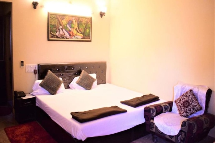 Imagen de la habitación del Hotel DS Residency Varanasi. Foto 19
