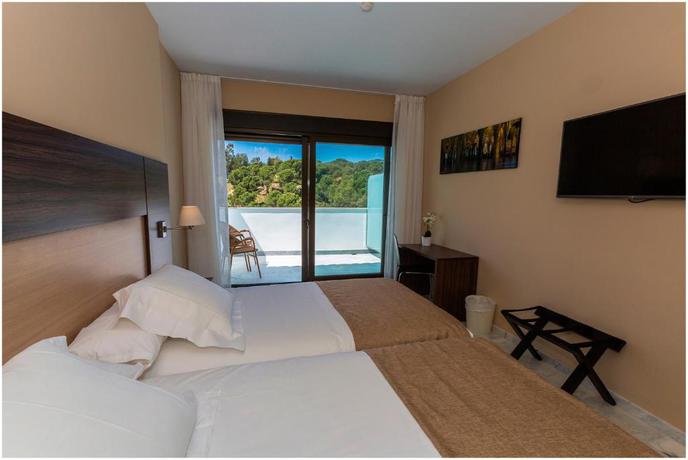 Imagen de la habitación del Hotel DWO Finca Los Abetos. Foto 8