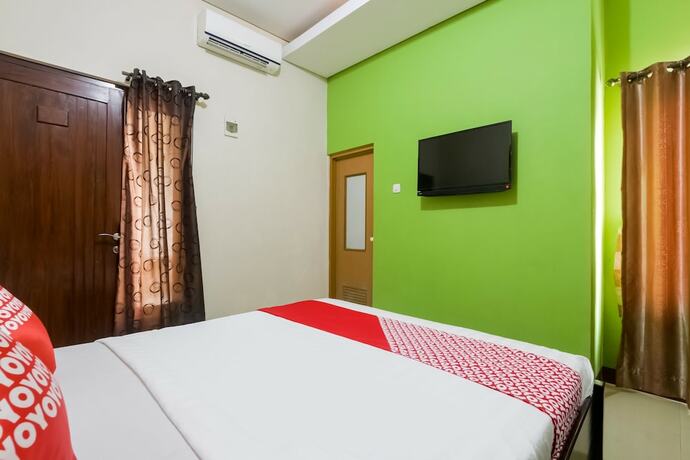 Imagen de la habitación del Hotel D'Waru Homestay Syariah near Jl Slamet Riyadi Mitra RedDoorz. Foto 15
