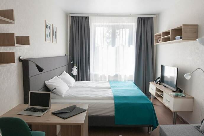 Imagen de la habitación del Hotel DZirconia Elagin Island Apartments. Foto 19