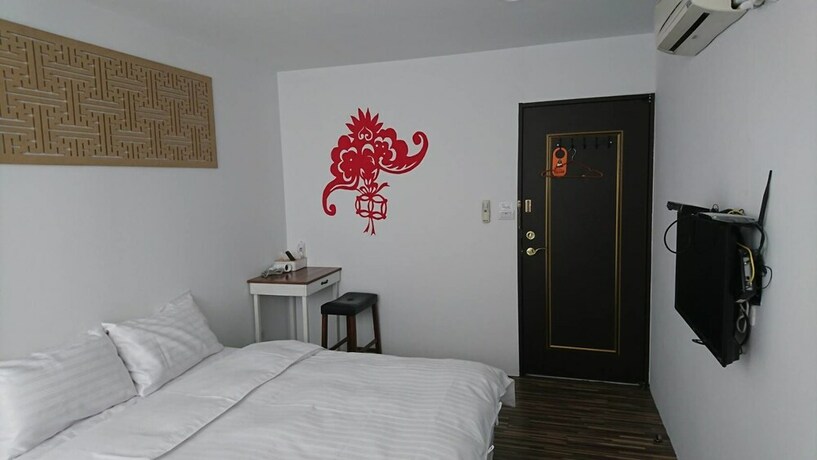 Imagen de la habitación del Hotel Da Fu Hao. Foto 27