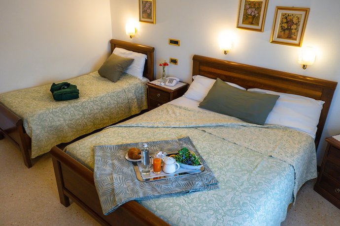 Imagen de la habitación del Hotel Da Gigi. Foto 7