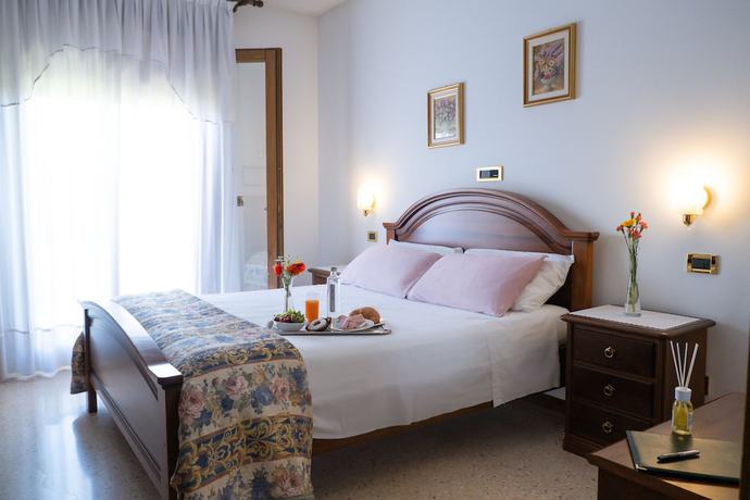 Imagen de la habitación del Hotel Da Gigi. Foto 13