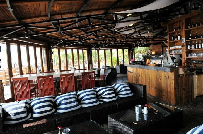 Imagen del bar/restaurante del Hotel Da Mei Sha Yacht Club Resort. Foto 11