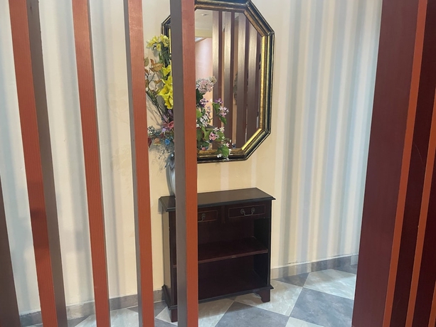 Imagen de la habitación del Hotel Da Palm inn. Foto 6