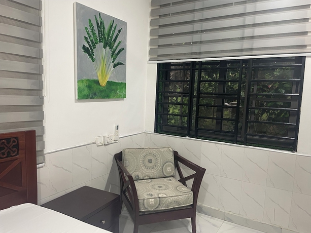 Imagen de la habitación del Hotel Da Palm inn. Foto 11