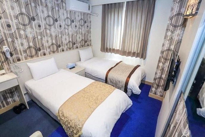 Imagen de la habitación del Hotel Da San Tong. Foto 3