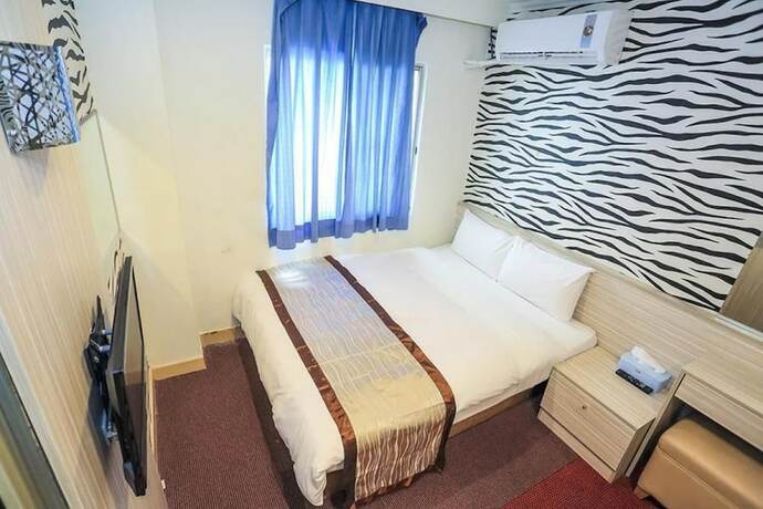 Imagen de la habitación del Hotel Da San Tong. Foto 4
