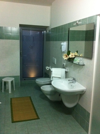 Imagen de la habitación del Hotel Da Santo. Foto 15