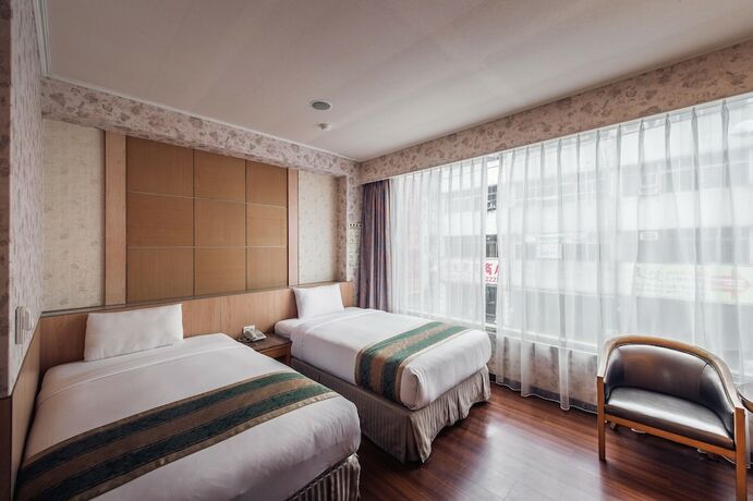 Imagen de la habitación del Hotel Da Shih. Foto 17