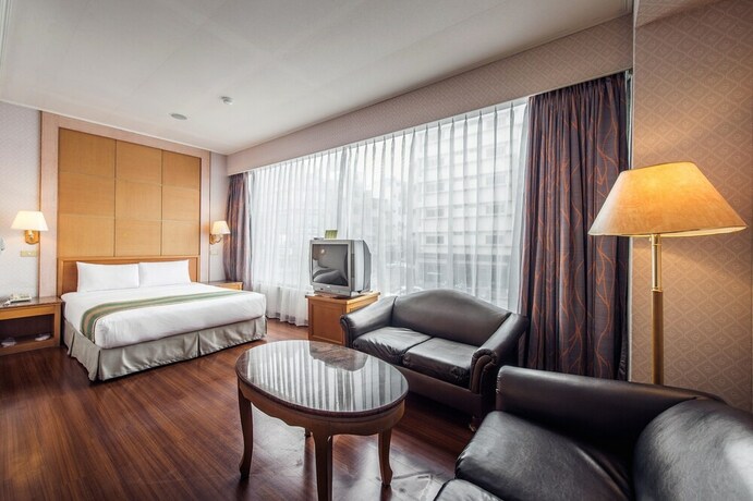 Imagen de la habitación del Hotel Da Shih. Foto 19