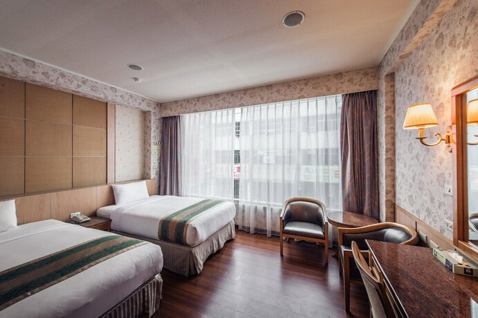 Imagen de la habitación del Hotel Da Shih. Foto 23