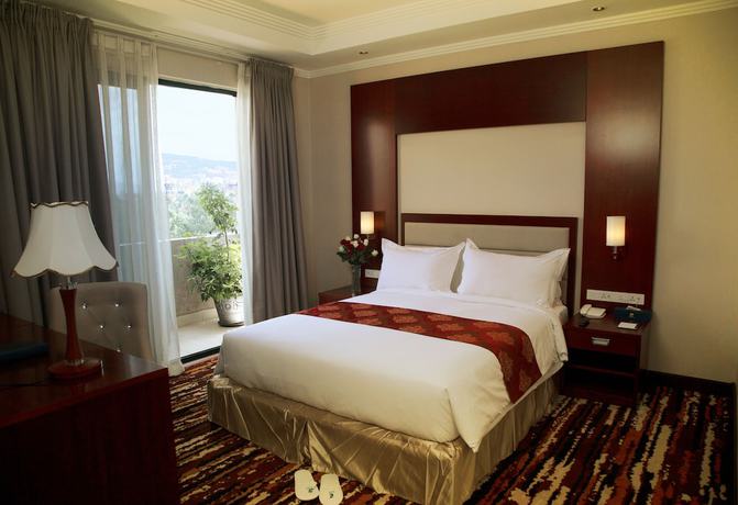 Imagen de la habitación del Hotel Daamat. Foto 12