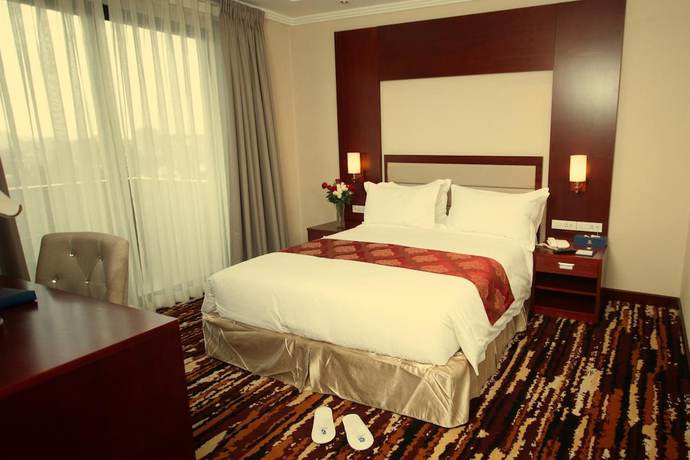 Imagen de la habitación del Hotel Daamat. Foto 13