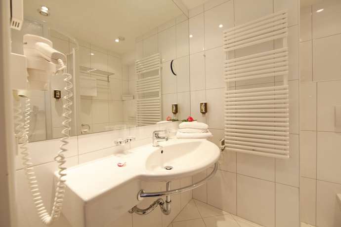 Imagen de la habitación del Hotel Dachstein. Foto 17