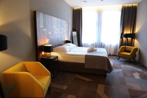 Imagen de la habitación del Hotel Dada Premium Aparthotel. Foto 18