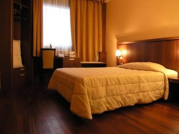 Imagen de la habitación del Hotel Dado International. Foto 2
