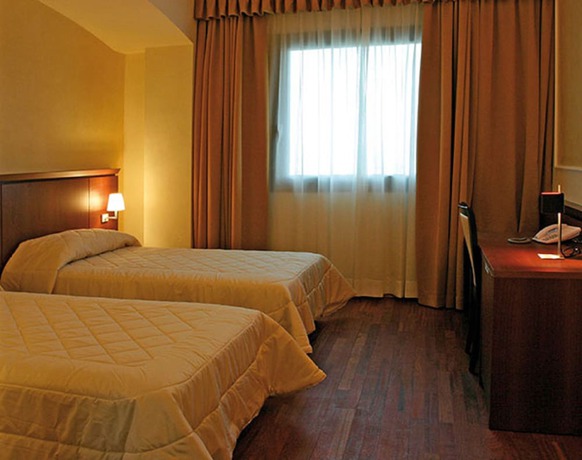 Imagen de la habitación del Hotel Dado International. Foto 5