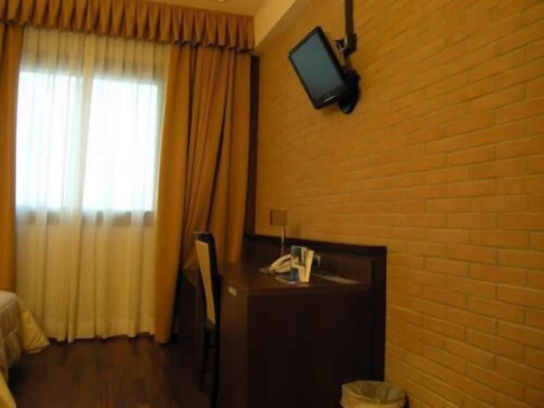 Imagen de la habitación del Hotel Dado International. Foto 6
