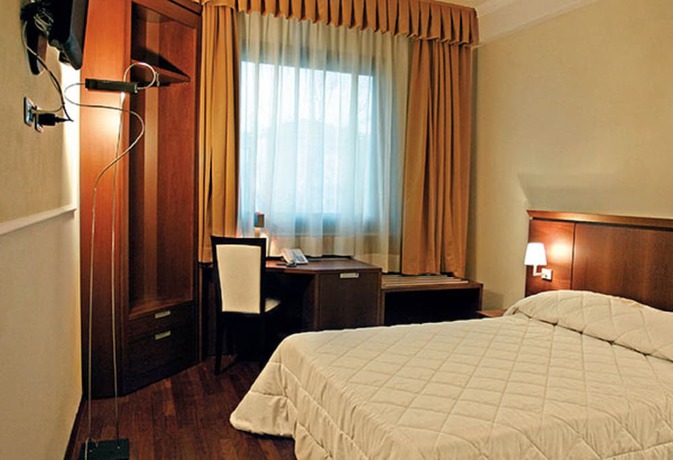 Imagen de la habitación del Hotel Dado International. Foto 9