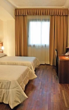 Imagen de la habitación del Hotel Dado International. Foto 10